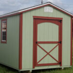 green and red custom storage shed for sale in lake park fl