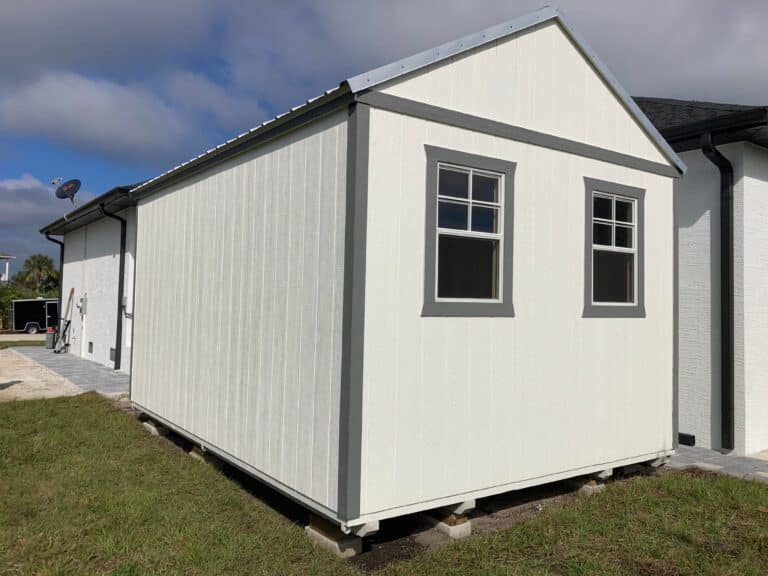 white lofted gable shed