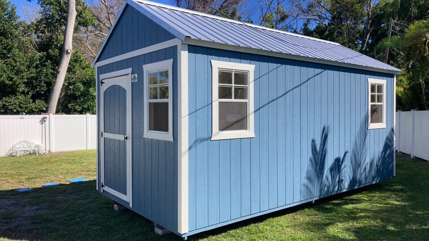 blue lofted gable shed with metal roof