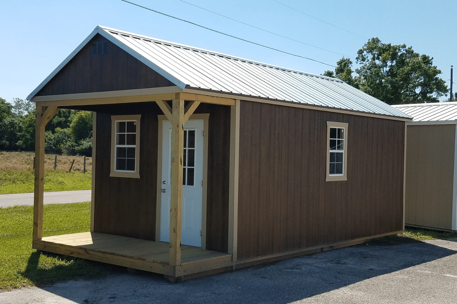 brown cabin with porch for sale in bradenton fl