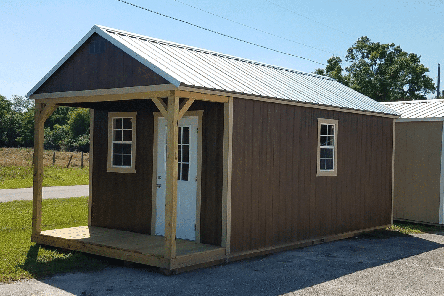 brown cabin with porch portable for sale in south florida