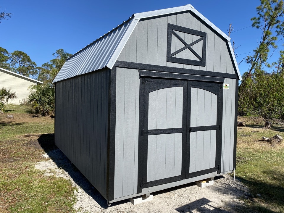 a grey barn shed standing nearby other sheds in fort lauderdale fl