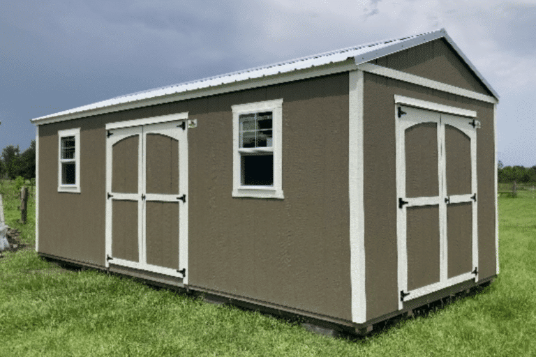 beige and white storage shed with double doors and windows in wauchula fl