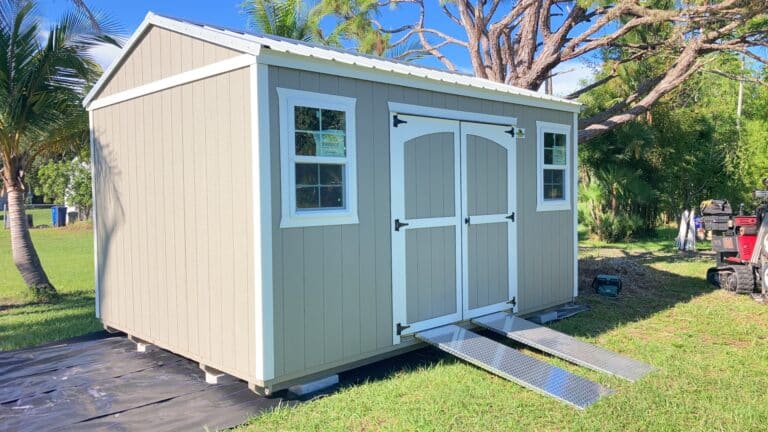 beige storage shed with ramps in boynton beach fl