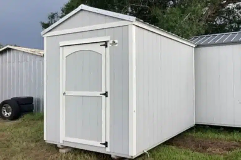 light blue studio sheds in myakka city fl with white trim