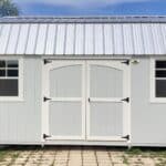 a white barn-style shed for sale in winter park fl