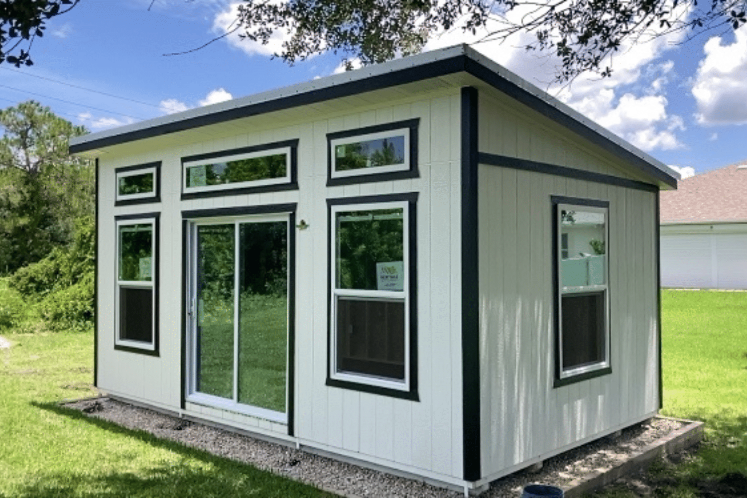 white and black studio shed with double door and windows in miami fl